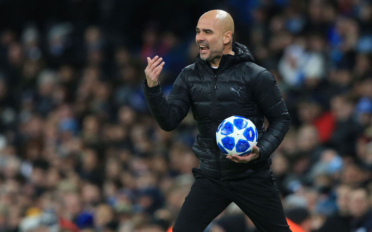 Manchester City’s Spanish manager Pep Guardiola gestures on the touchline during the UEFA Champions League group F football match between Manchester City and Hoffenheim at the Etihad stadium in Manchester, north west England on December 12, 2018. AFP