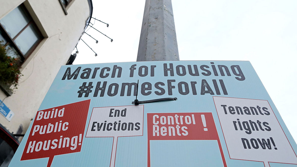 A poster promoting tenants rights is pictured secured to a lamppost in Dublin City centre on 10 December 2018. Photo: AFP