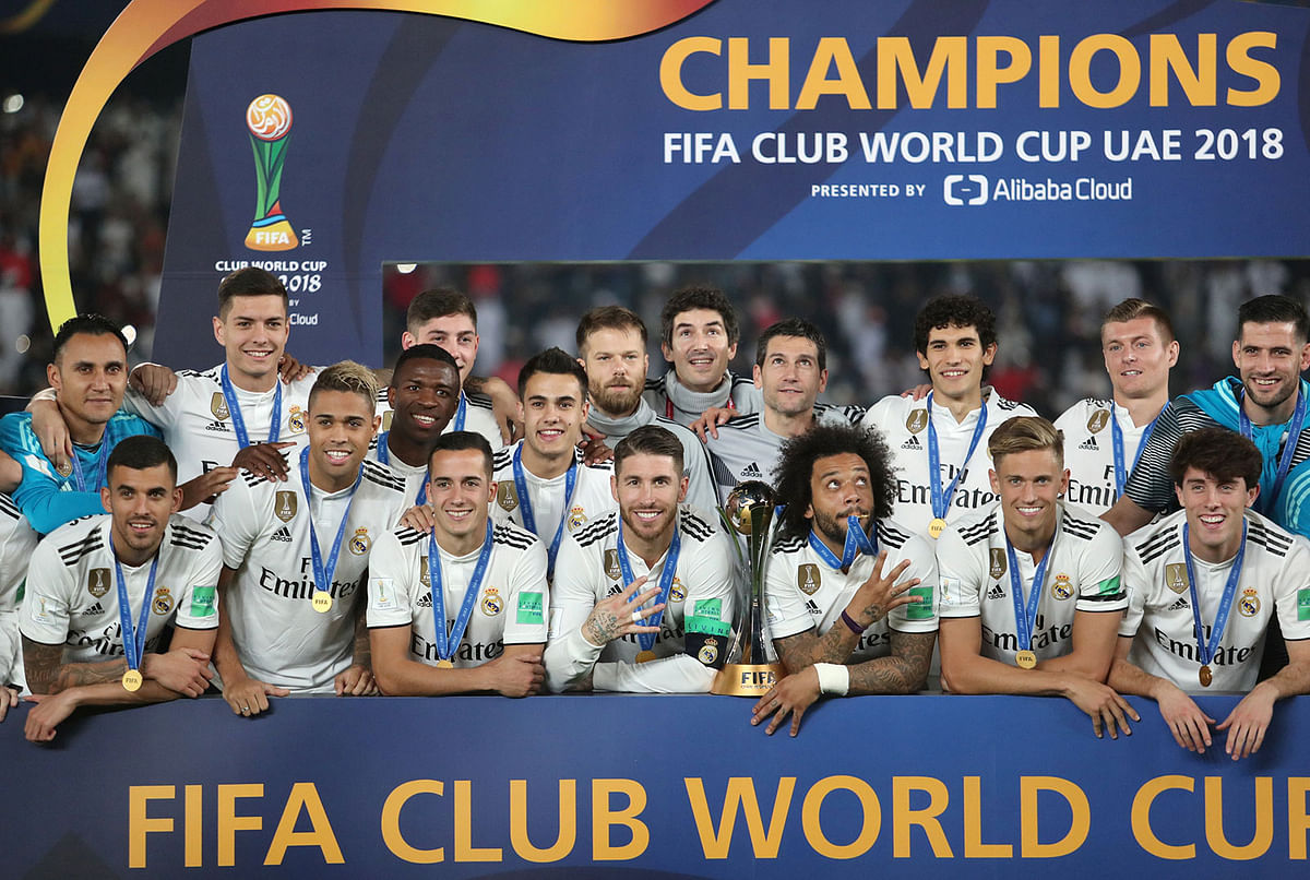 Real Madrid players celebrate with the trophy after winning the Club World Cup. Photo: Reuters