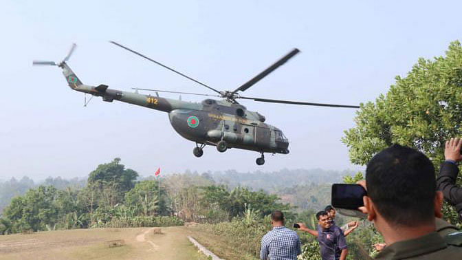 Election materials being carried to 19 remote centres of Rangamati on 28 December, 2018. Photo: Supriya Chakma