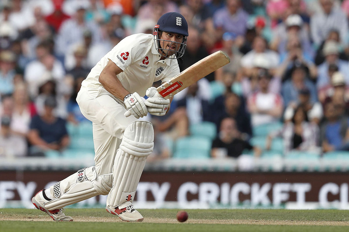 In this file photo taken on 9 September 2018 England`s Alastair Cook plays a shot, batting in his final Test Match Innings, during play on the third day of the fifth Test cricket match between England and India at The Oval in London on 9 September 2018. Photo: AFP