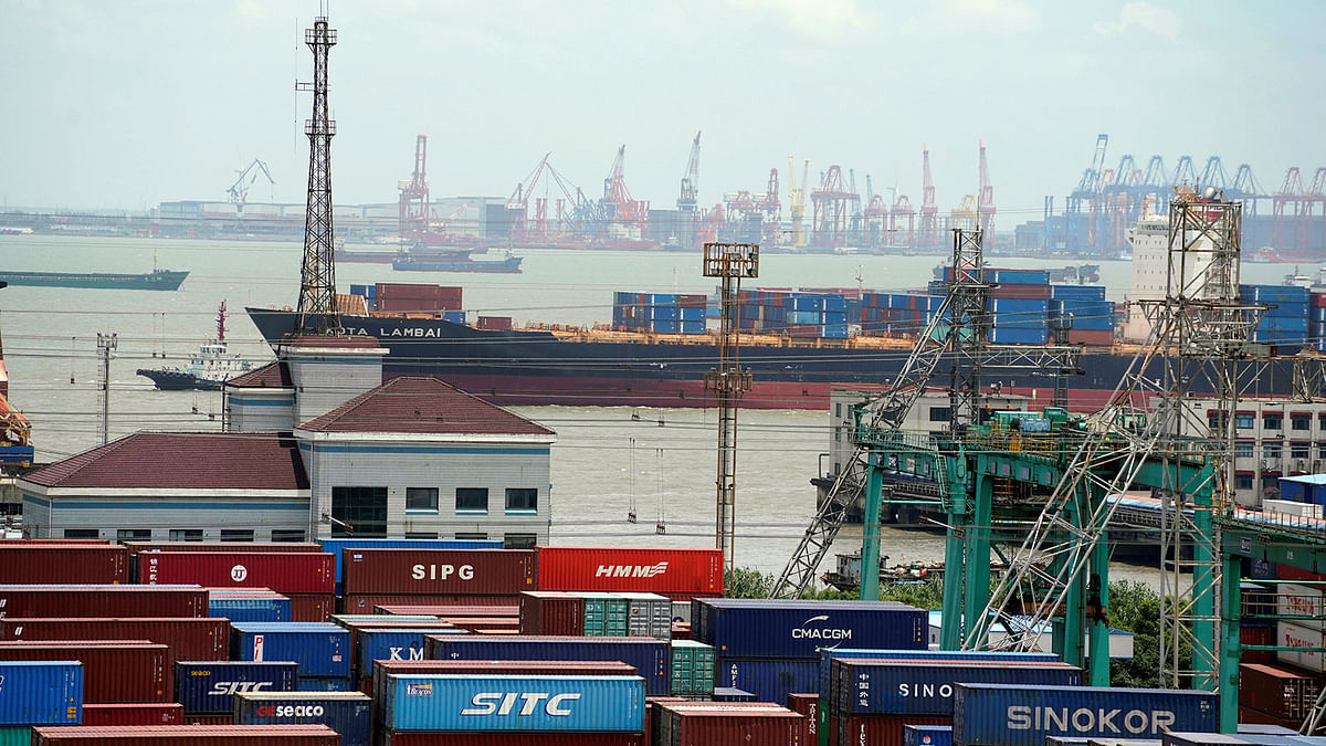 Shipping containers are seen at a port in Shanghai, China on 10 July. Photo: Reuters