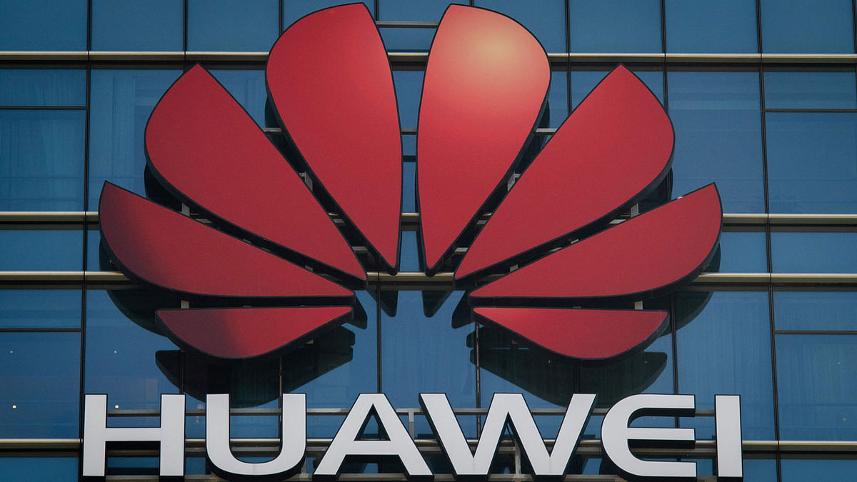 In this file photo taken on 18 December 2018 The Huawei logo stands on a Huawei office building in Dongguan in China’s southern Guangdong province on 18 December 2018. Photo: AFP