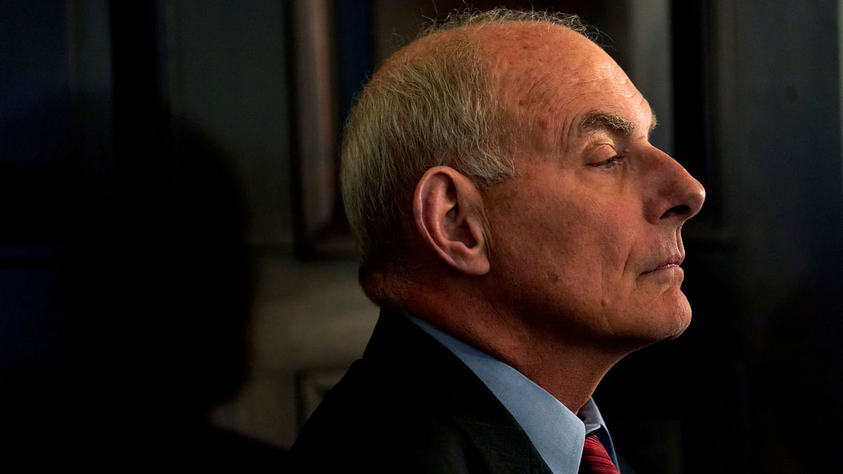 White House chief of staff John Kelly listens as US president Donald Trump hosts a `California Sanctuary State Roundtable` at the White House in Washington, US on 16 May. Photo: AFP