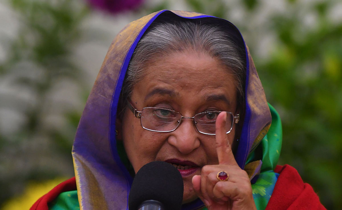 Prime minister Sheikh Hasina gestures while speaking at a press conference in Dhaka on 31 December, 2018. Photo: AFP