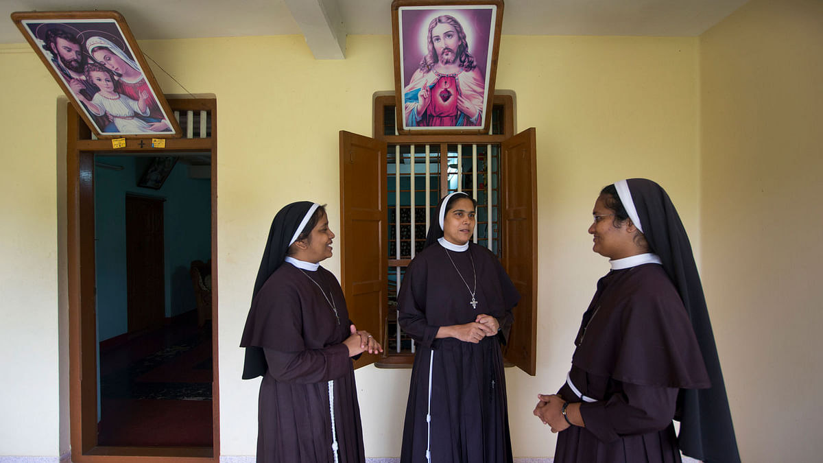 In this photo taken on 4 November in 2018, Sister Josephine Villoonnickal, left, Sister Alphy Pallasseril, centre, and Sister Anupama Kelamangalathu, who have supported the accusation of rape against Bishop Franco Mulakkal, talk at St Francis Mission Home, in Kuravilangad in southern Indian state of Kerala. Photo: AP