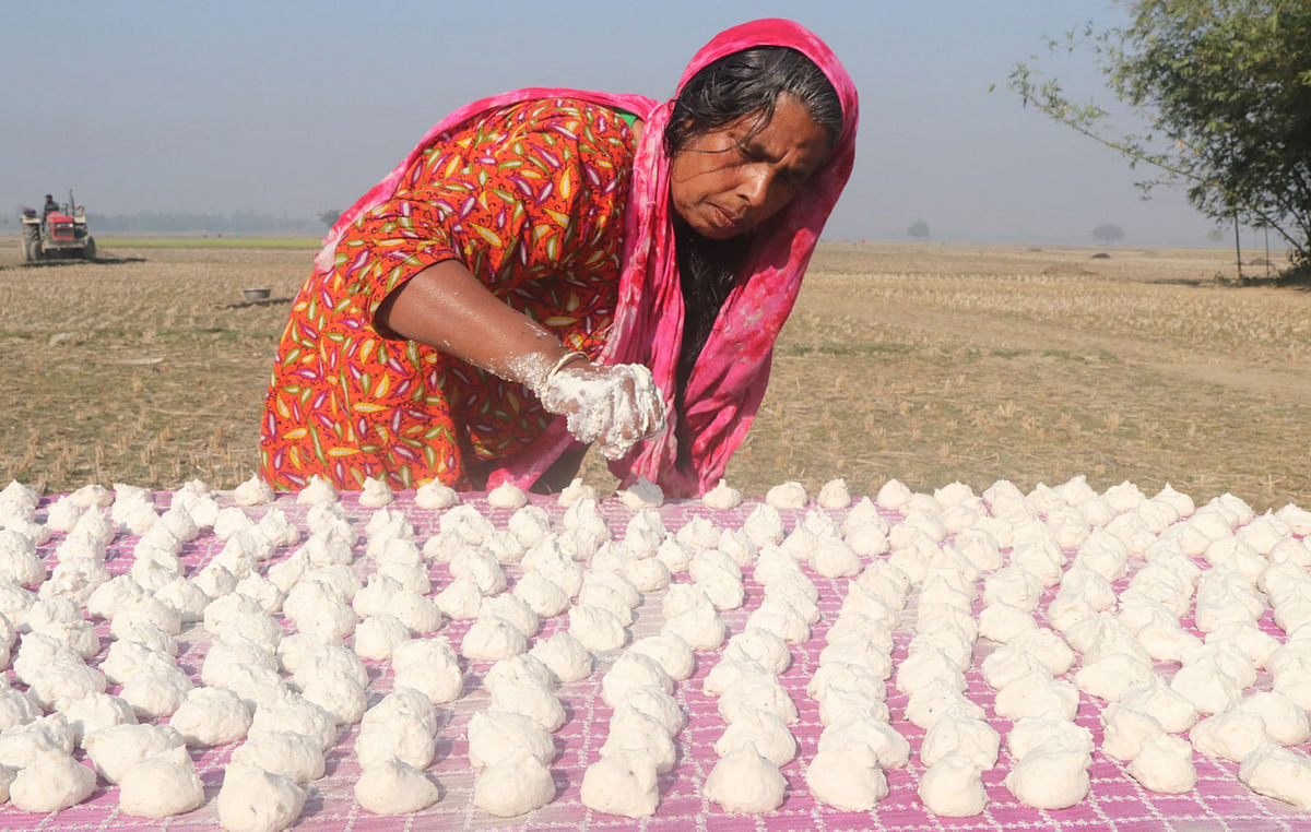 A woman making daler bori, an item made of lentils, at Panchkyatuli, Gabtali in Bogura on 2 January. Photo: Soel Rana