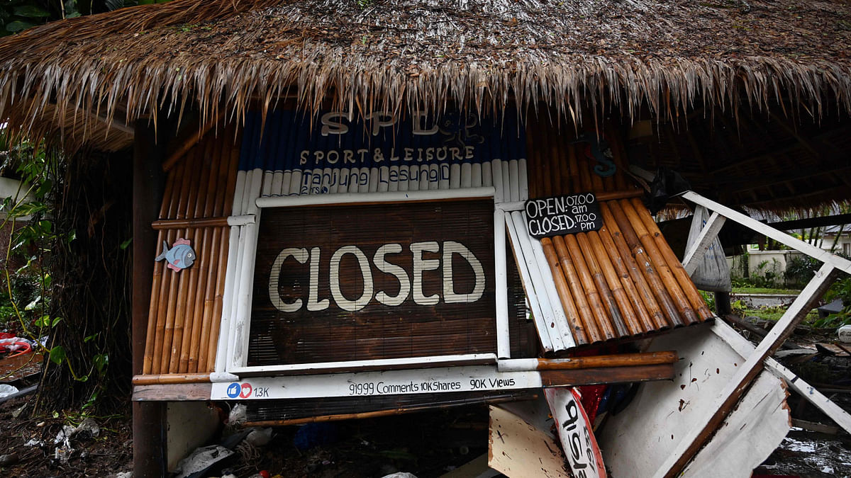 A sign at the sport and leisure centre is seen at the Tanjung Lesung Beach resort in Tanjung Lesung, Banten province on December 26, 2018, after a tsunami - caused by activity at a volcano known as the `child` of Krakatoa - hit the west coast of Indonesia`s Java island on 22 December. Photo: AFP