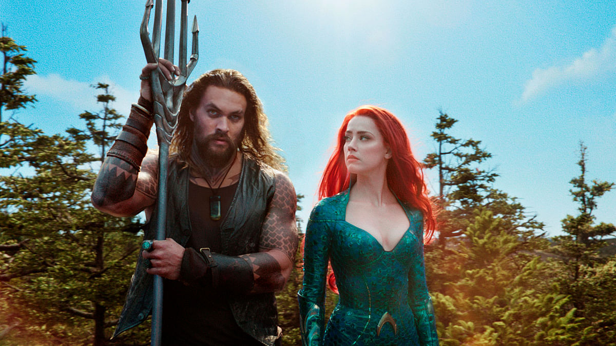 This image released by Warner Bros. Pictures shows Jason Momoa, left, and Amber Heard in a scene from ‘Aquaman’.  Photo: AP