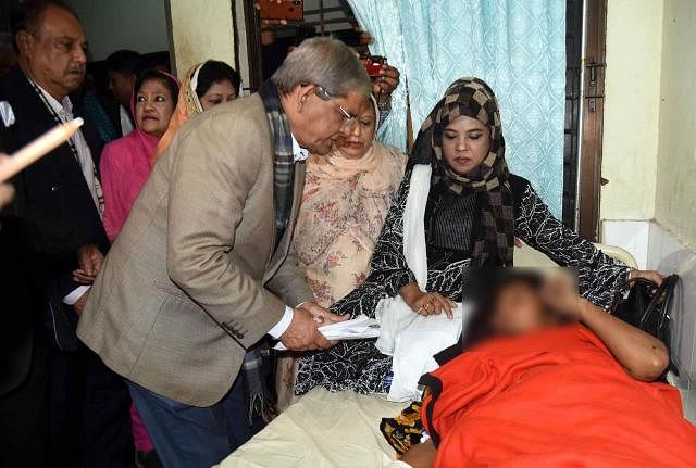 BNP secretary general Mirza Fakhrul Islam Alamgir consoles Noakhali rape victim on Saturday.