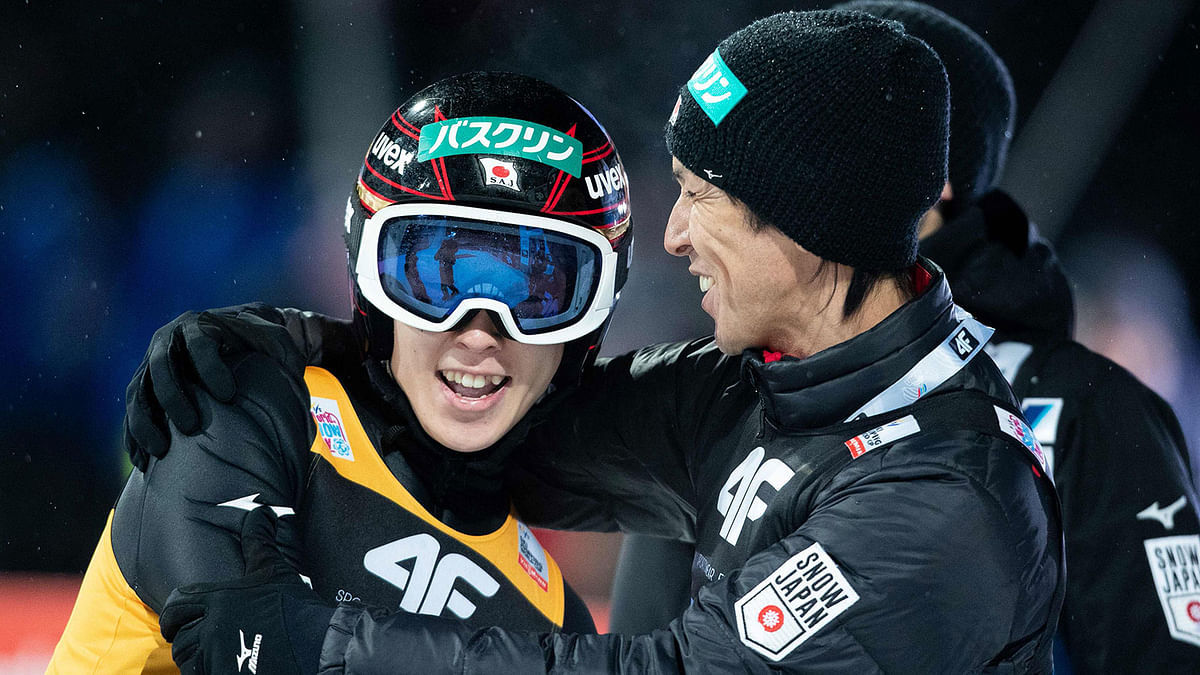 Japan’s Ryoyu Kobayashi celebrates with Noriaki Kasai of Japan ® after winning the fourth stage of the Four-Hills Ski Jumping tournament (Vierschanzentournee), in Bischofshofen, Austria, on 6 January 2019. Photo: AFP