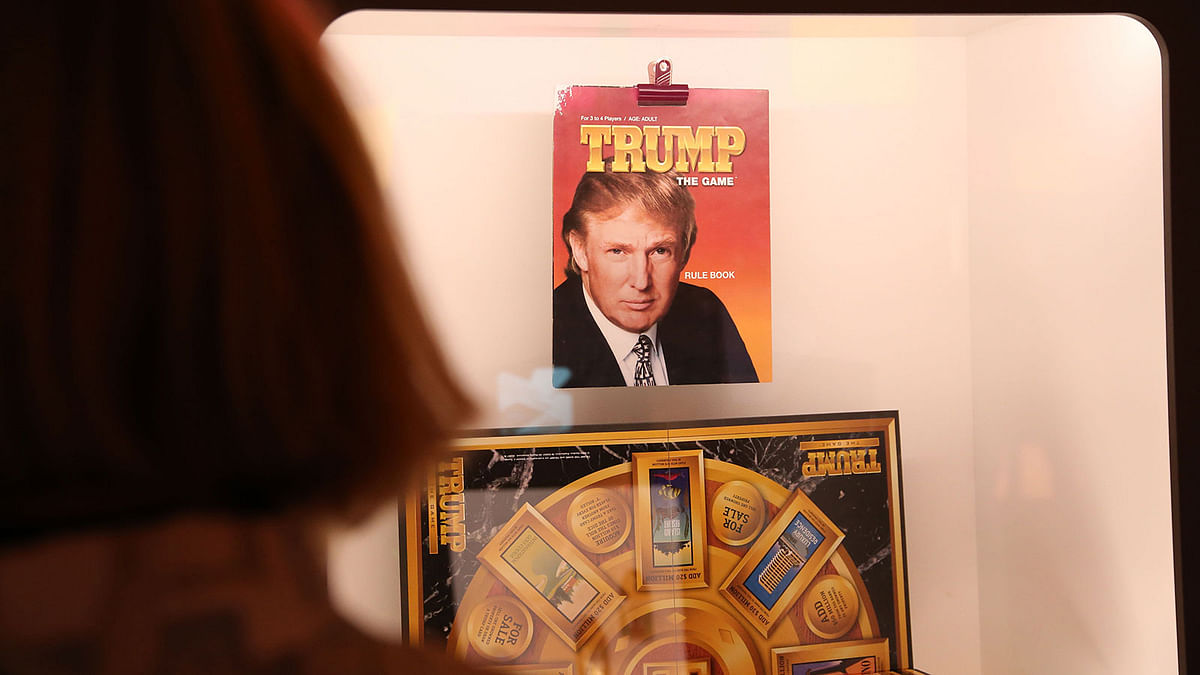 A visitor looks at a display of ‘Trump - the Game,’ a boardgame themed around Donald Trumps’s real estate business, originally released in 1989 and then again in 1990, on display at the ‘Museum of Failure’ in Helsingborg, Sweden on 2 January 2019. Photo: AFP