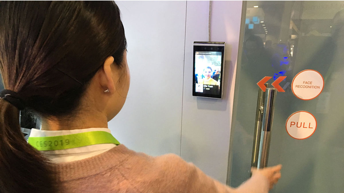 Ella Yuan of the Chinese startup Tuya shows how facial recognition can be used in a home security system to allow or deny entry, at the Consumer Electronics Show in Las Vegas on 9 January 2019. Photo: AFP