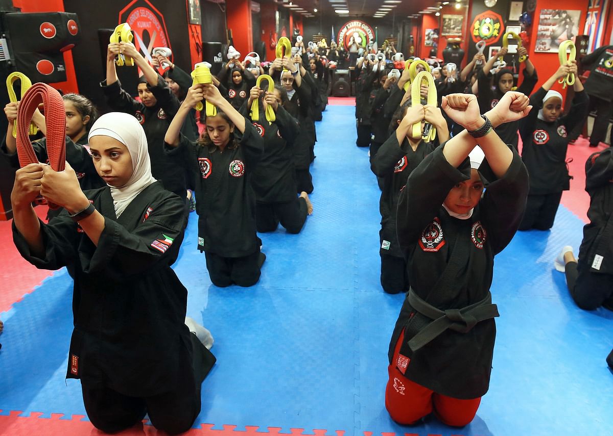 Kuwaiti women practise hybrid martial art Kajukenbo in a club in Kuwait City on 22 October 2018. Photo: AFP