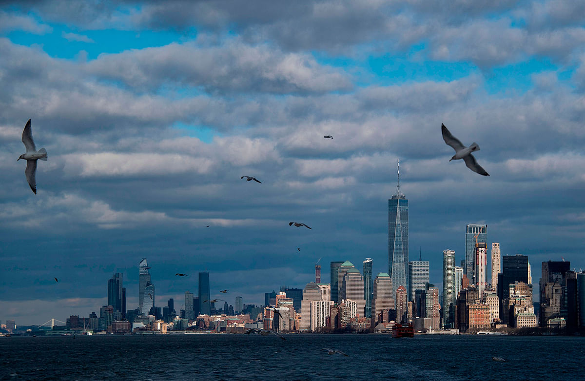 The sun shines in lower Manhattan seen from the Staten Island Ferry on 9 January 2019 in New York. Photo: AFP