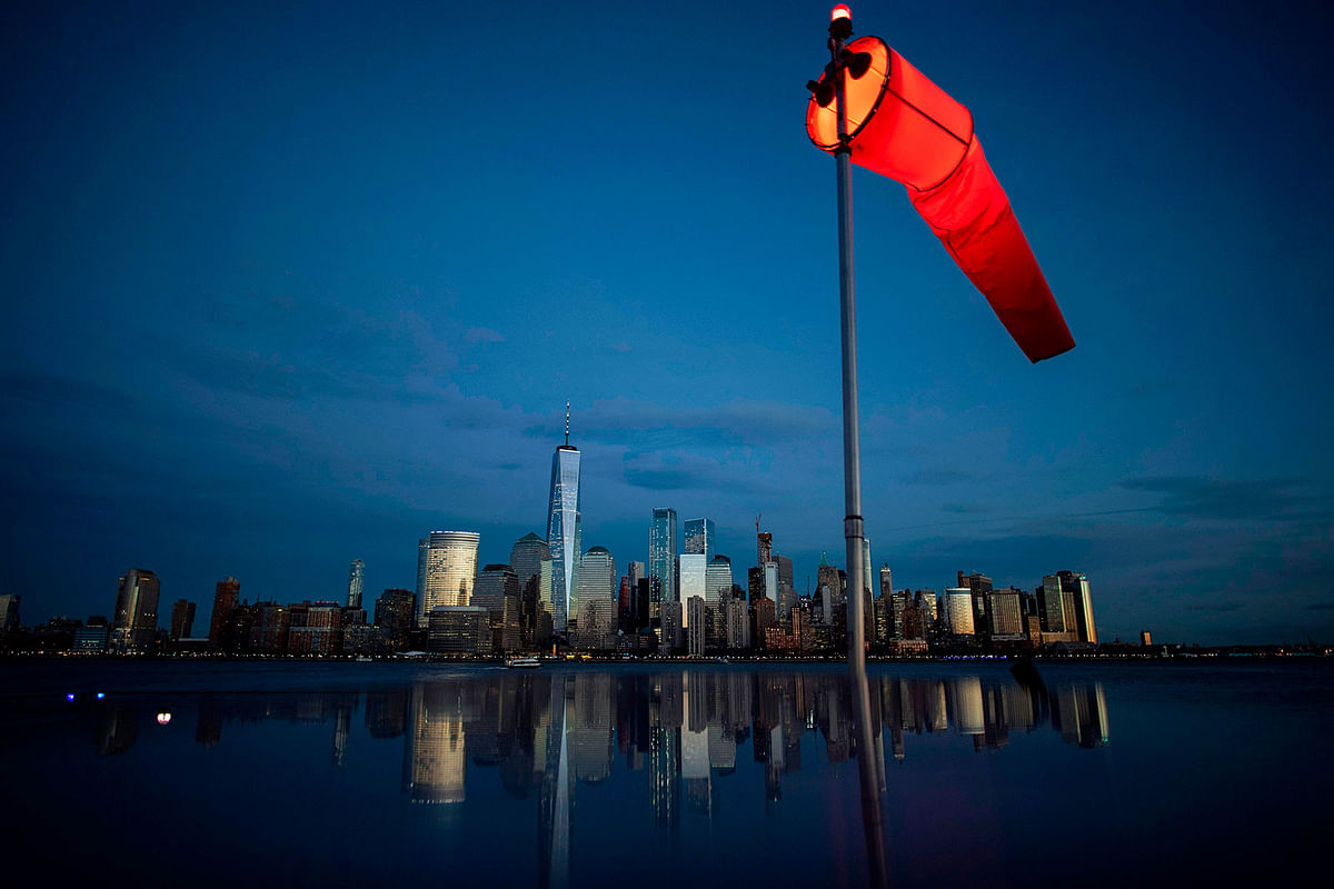 A windsock is seen next to the Hudson River in front of Manhattan skyline in New York City on 10 January 2019. Photo: AFP