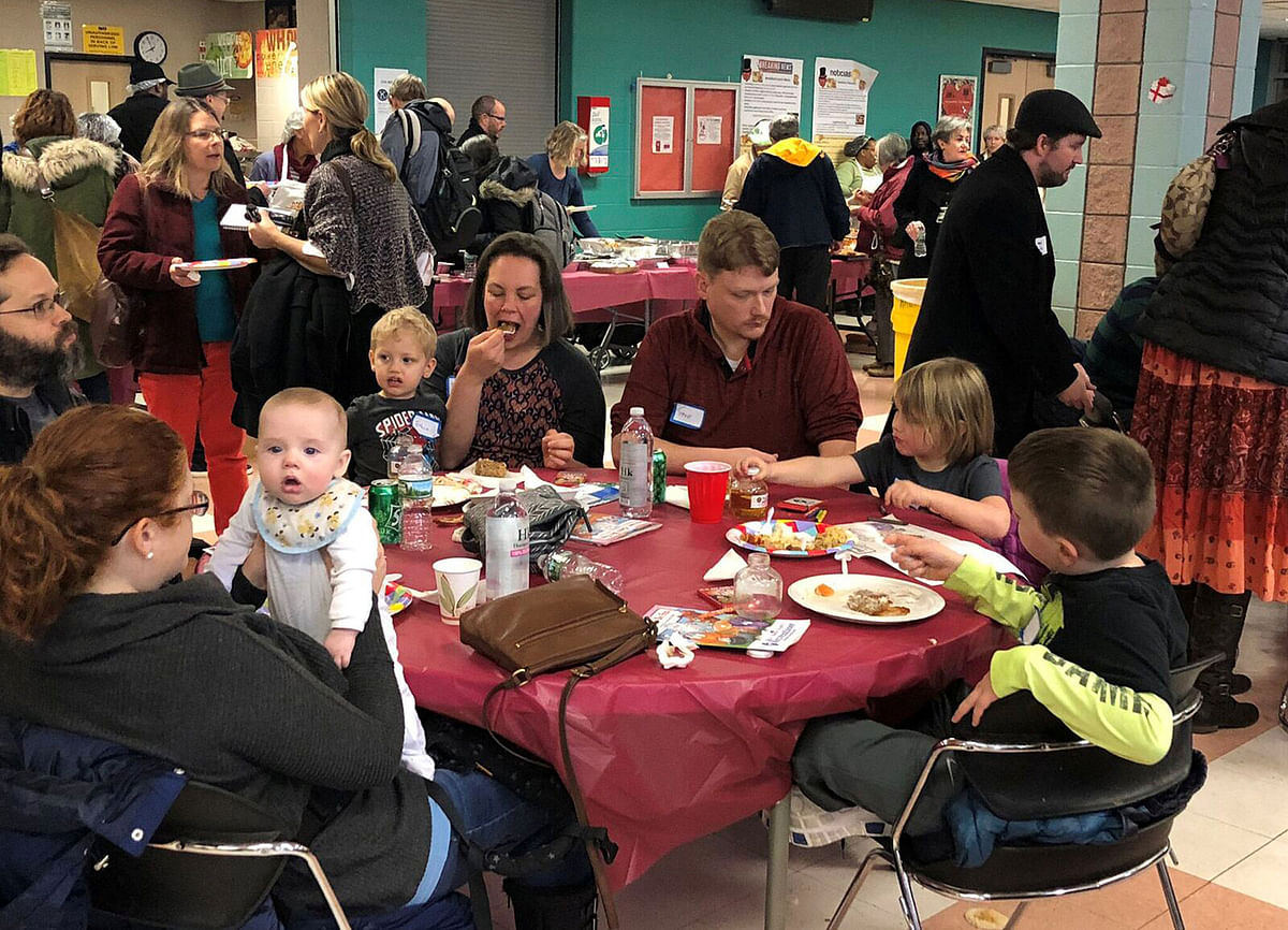 Furloughed government workers, contractors and their families attended a free community dinner donated from families and community organisations during the partial US government shutdown at Montgomery Blair High School in Silver Spring, Maryland, US, on 11 January 2019. Photo: Reuters