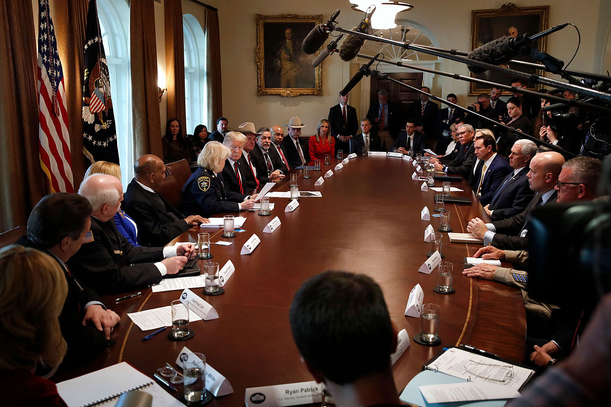 US president Donald Trump, centre left, leads a roundtable discussion on border security with local leaders, on 11 January 2019, in the Cabinet Room of the White House in Washington. Photo: AP