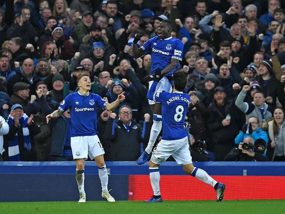 Everton`s French defender Kurt Zouma celebrates scoring the opening goal during the English Premier League football match between Everton and Bournemouth at Goodison Park in Liverpool on 13 January. Photo: AFP, north west England on January 13, 2019.