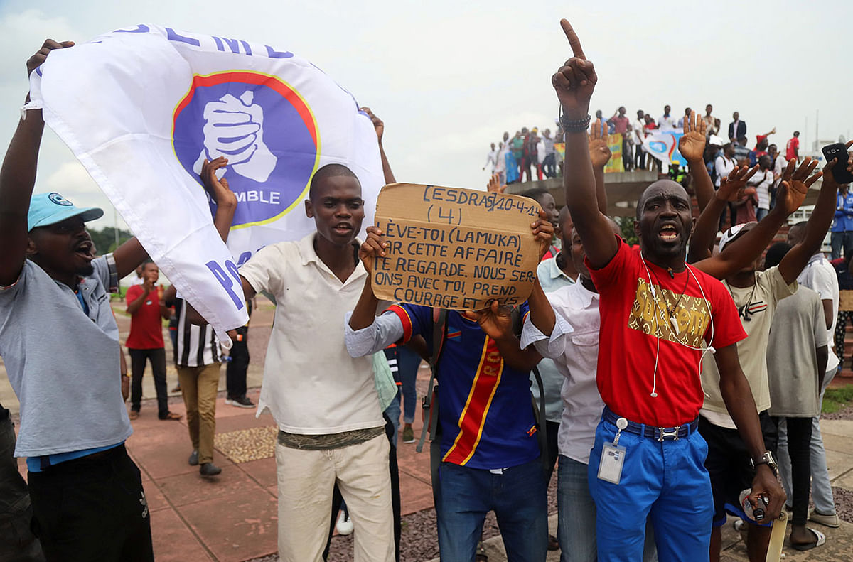 Supporters of Martin Fayulu, runner-up in Democratic Republic of Congo`s presidential election, chant slogans as he delivers his appeal contesting the Congo`s National Independent Electoral Commission (CENI) results of the presidential election at the constitutional court in Kinshasa, Democratic Republic of Congo, on 12 January 2019. Photo: Reuters