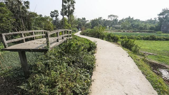 The road was constructed when the BNP was in power while the bridge was built by the AL government in Masuri of Rupganj upazila in Narayanganj. Photo: Dipu Malakar