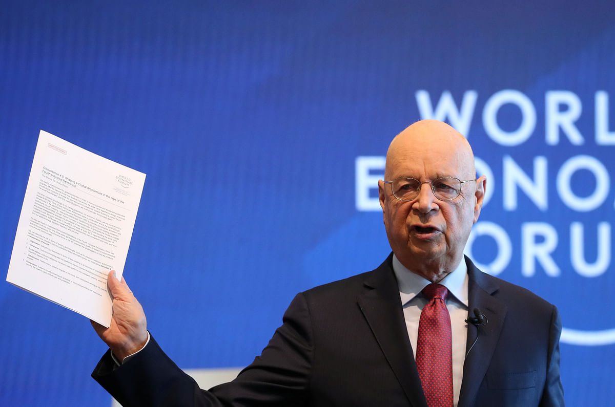 Klaus Schwab, founder and executive chairman of the World Economic Forum holds the meeting`s manifesto as he addresses a news conference ahead of the Davos annual meeting in Cologny near Geneva, Switzerland, on 15 January 2019. Photo: Reuters