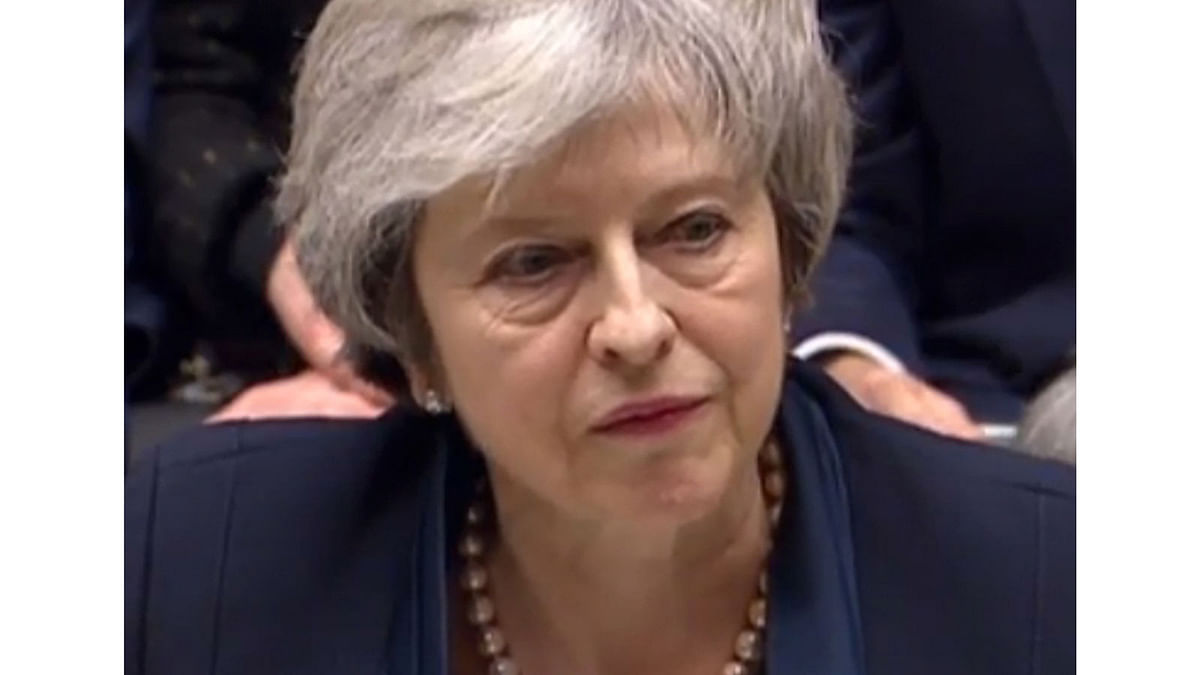 A video grab from footage broadcast by the UK Parliament`s Parliamentary Recording Unit (PRU) shows Britain`s prime minister Theresa May as she speaks in the House of Commons in London on 15 January 2019, after MPs voted against the government`s Brexit deal. Photo: AFP