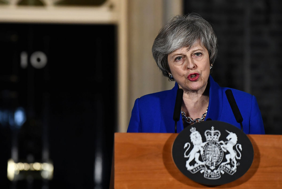 Britain`s prime minister Theresa May makes a statement following winning a confidence vote, after Parliament rejected her Brexit deal, outside 10 Downing Street in London, Britain, on 16 January 2019. Photo: Reuters