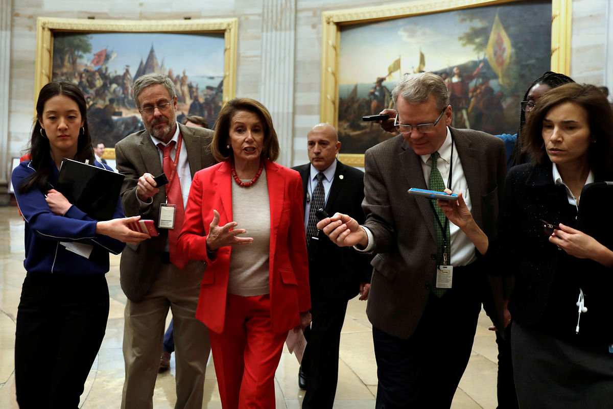 US House Speaker Nancy Pelosi (D-CA) talks to reporters as she walks on Capitol Hill in Washington, US, on 16 January 2019. Photo: Reuters
