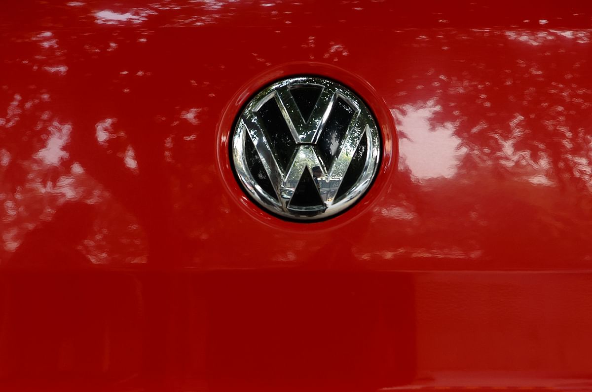 A logo of German automaker Volkswagen is pictured in New Delhi on 17 January 2019. India`s environmental court on 17 January gave 24 hours to German automaker Volkswagen to pay $14 million after holding it responsible for violating country`s pollution norms by fudging emission devices. -- Photo: AFP