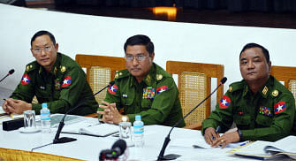Myanmar Army top officials Major General Tun Tun Nyi (L), Major General Soe Naing Oo (C) and Major General Zaw Min Tun (R) attend a rare military press conference at the Defence Service Museum in capital Naypyidaw on 18 January 2019. Myanmar`s army said January 18 it killed 13 ethnic Rakhine fighters in counterstrikes after the well-armed group carried out deadly attacks on police posts earlier this month. Photo: AFP