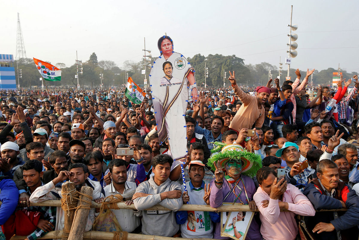 A supporter holds a cut-out of Mamata Banerjee, chief minister of the state of West Bengal, during `United India` rally attended by the leaders of India`s main opposition parties ahead of the general election, in Kolkata, India, 19 January, 2019. Photo: Reuters