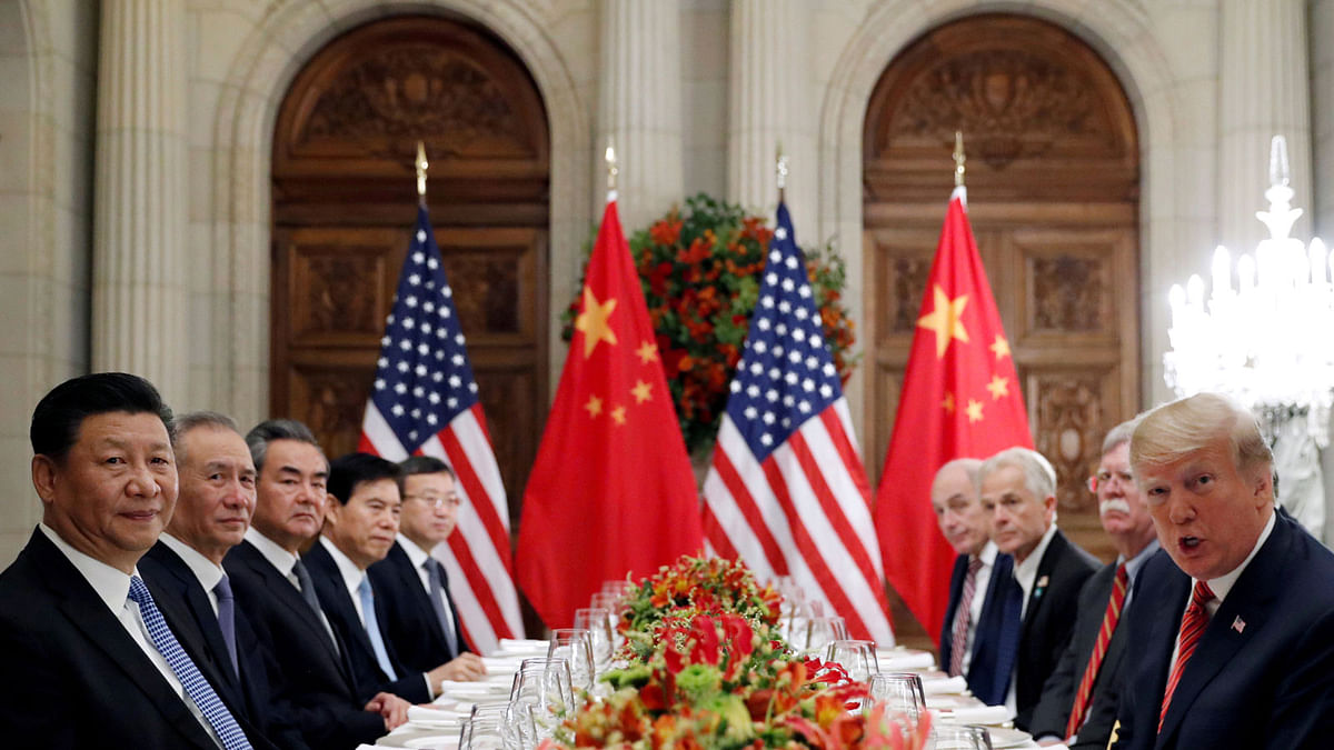 US president Donald Trump, US secretary of state Mike Pompeo, US president Donald Trump`s national security adviser John Bolton and Chinese president Xi Jinping attend a working dinner after the G20 leaders summit in Buenos Aires, Argentina on 1 December 2018. Photo: Reuters