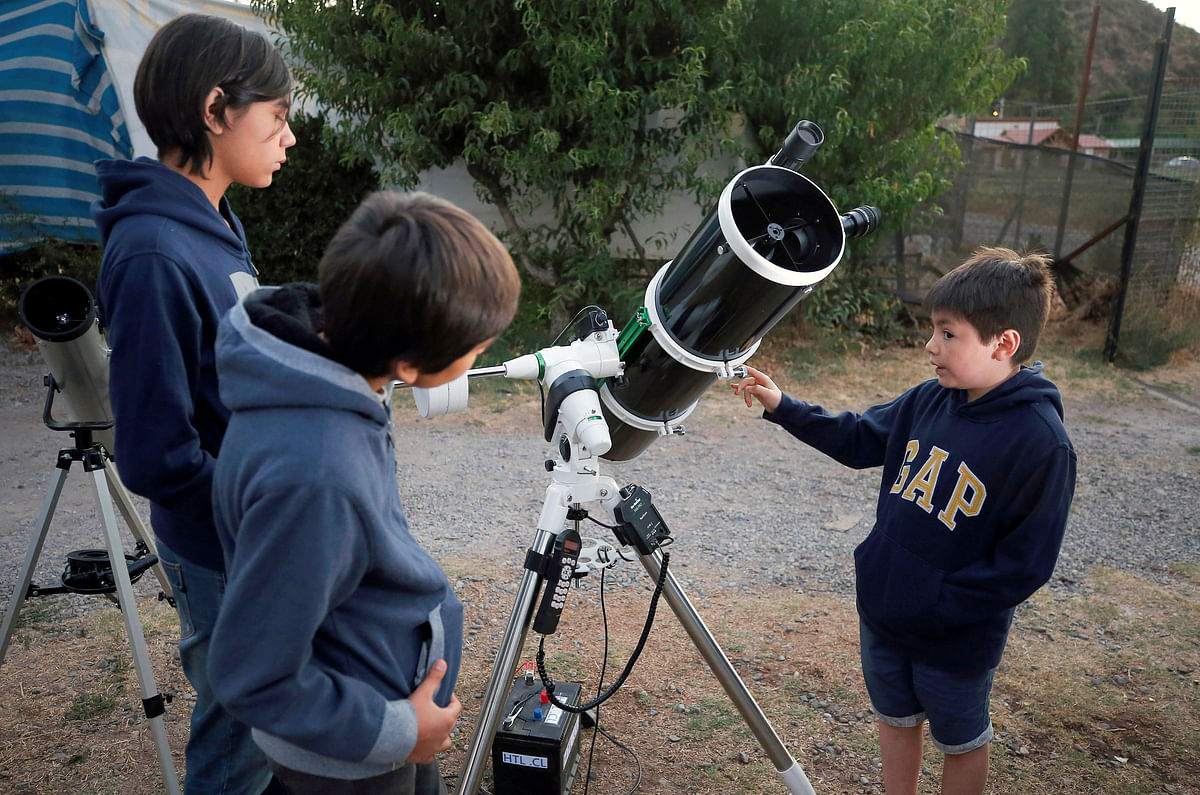 Ricardo Barriga, 10, speaks and teaches astronomy to younger in hopes of raising money for his own astronaut suit, Pirque, Chile on 16 January 2019. Photo: Reuters