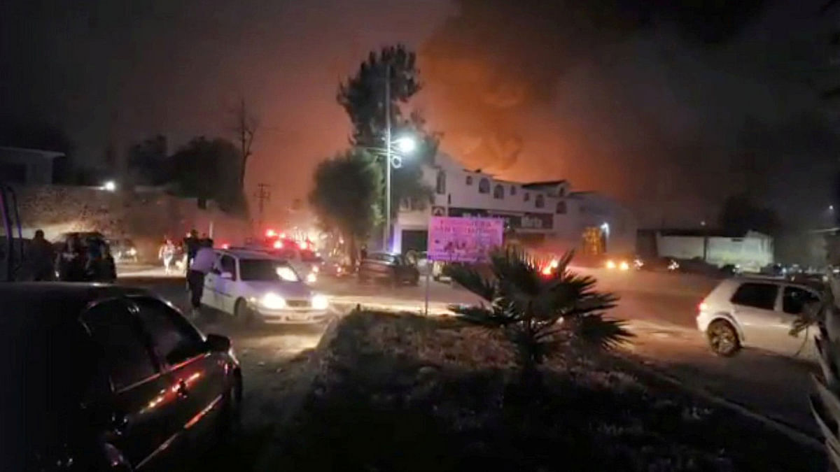 People react at the scene where a ruptured fuel pipeline exploded, in the municipality of Tlahuelilpan, Hidalgo, Mexico, near the Tula refinery of state oil firm Petroleos Mexicanos (Pemex), on 18 January 2019 in this still image taken from a video obtained from social media.Photo: Reuters