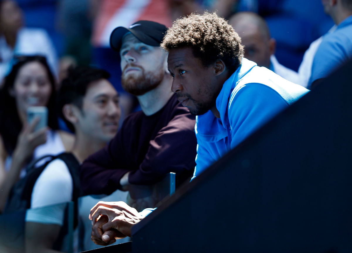 France`s Gael Monfils watches the match between Ukraine`s Elina Svitolina and China`s Zhang Shuai at Australian Open Third Round held at Melbourne Park, Australia on 19 January 2019. Photo: AFP