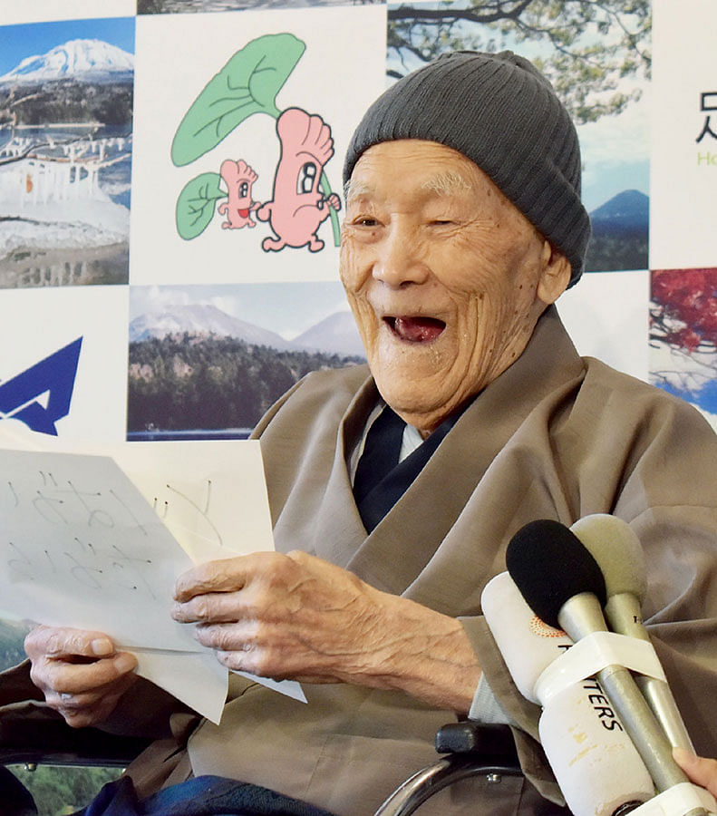 This file photo taken on April 10, 2018 shows Masazo Nonaka of Japan, then aged 112, smiling after being awarded the Guinness World Records` oldest male person living title in Ashoro, Hokkaido prefecture. Photo: AFP
