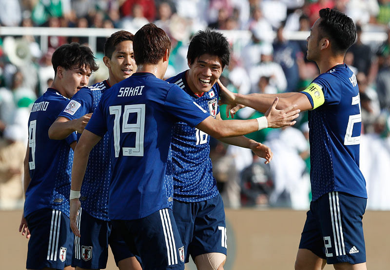 Japan`s defender Takehiro Tomiyasu, second right, celebrates after scoring the opening goal during the AFC Asian Cup round of 16 soccer match between Japan and Saudi Arabia at the Sharjah Stadium in Sharjah, United Arab Emirates, Monday, 21 January 2019. Photo: AP
