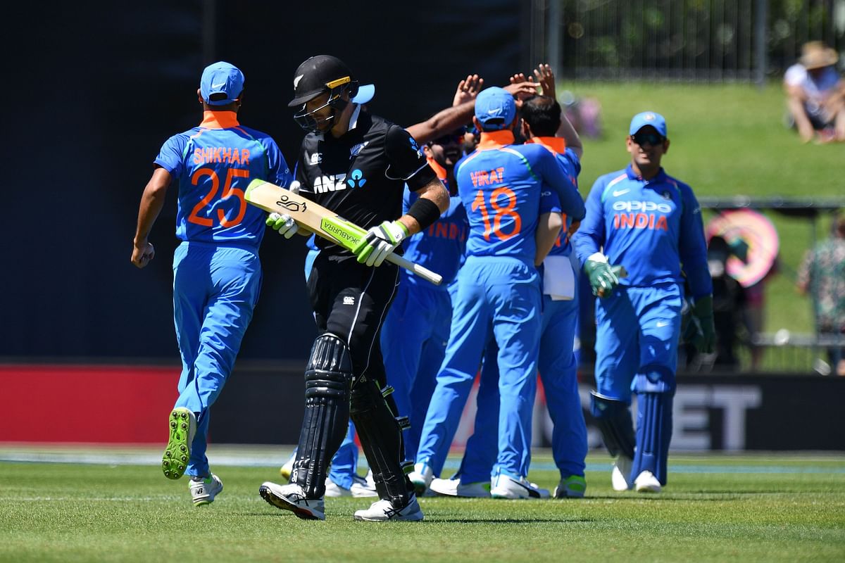 New Zealand`s Martin Guptill (front) walks off after being dismissed during the first one-day international (ODI) cricket match between New Zealand and India at McLean Park in Napier on 23 January 2019. Photo: AFP