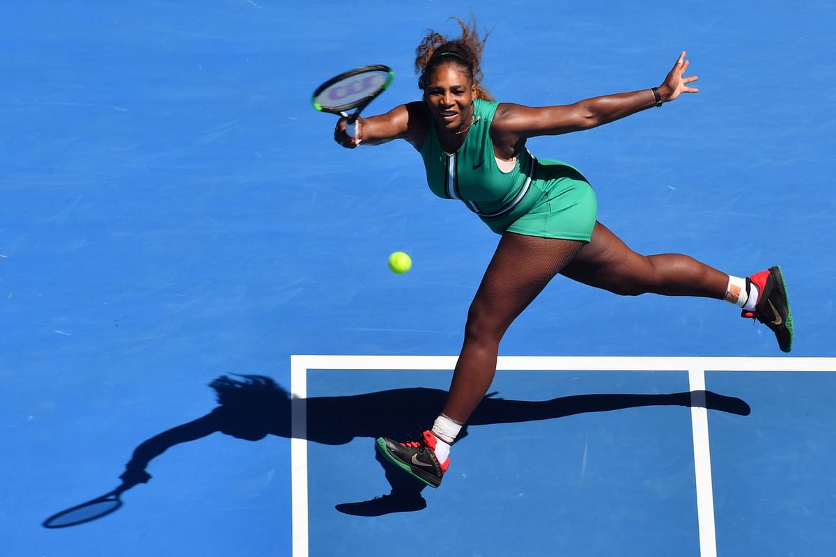 Serena Williams of the US hits a return against Czech Republic`s Karolina Pliskova during their women`s singles quarter-final match on day ten of the Australian Open tennis tournament in Melbourne on 23 January 2019. Photo: AFP