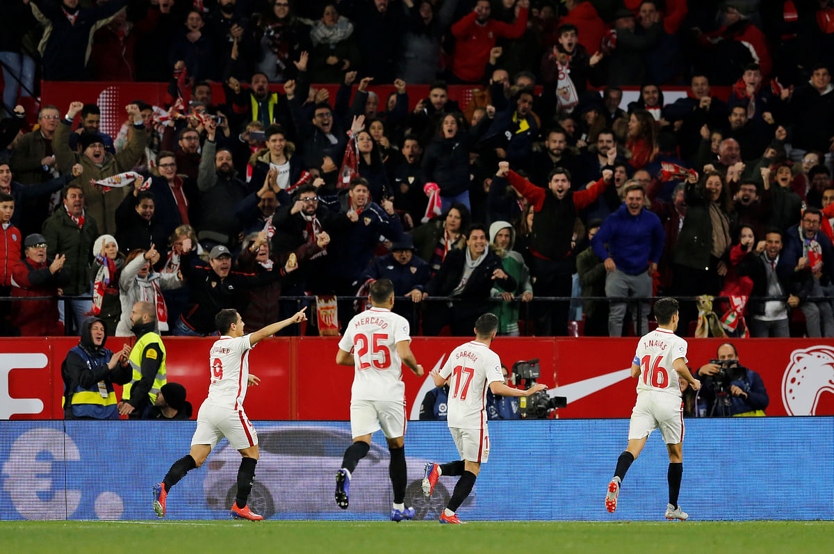 Sevilla`s Pablo Sarabia celebrates scoring their first goal with team mates against FC Barcelona in the First Leg of Quarter Final of Copa del Rey at Seville, Spain on 23 January 2019. Photo: Reuters