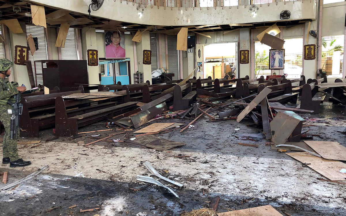This handout photo released by Armed Forces of the Philippines (AFP) Public Information Office (PIO) Western Mindanao Command (WESTMINCON) taken on 27 January 2019, shows debris inside a Catholic Church where two bombs exploded in Jolo, Sulu province on the southern island of Mindanao. Photo: AFP