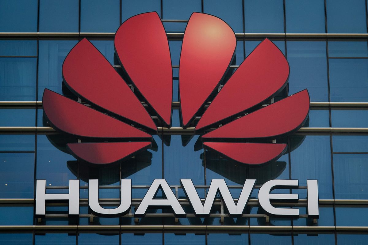 In this file photo taken on 18 December 2018 the Huawei logo stands on a Huawei office building in Dongguan in China’s southern Guangdong province. The US Justice Department unveiled on January 28, 2019 sweeping charges against Chinese telecommunications giant Huawei in two cases likely to ratchet up tensions between the two superpowers. Photo: AFP