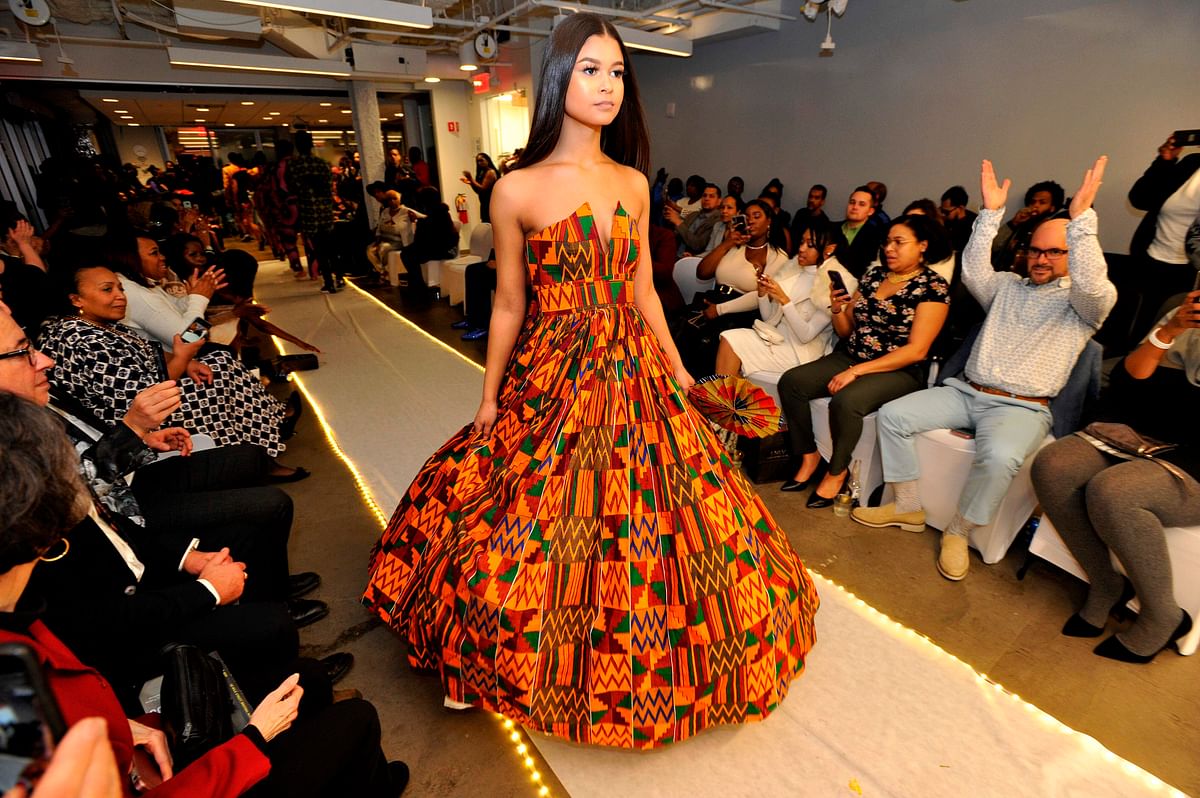 Ashanti Syed, who lost her uncle to a shooting on Valentine’s Day 2018, takes to the runway in an African inspired gown designed by Akwasi Oduro Boakye Yiadom during the Battle of the Brands fashion show in Boston, Massachusetts on 27 January 2019. Photo: AFP