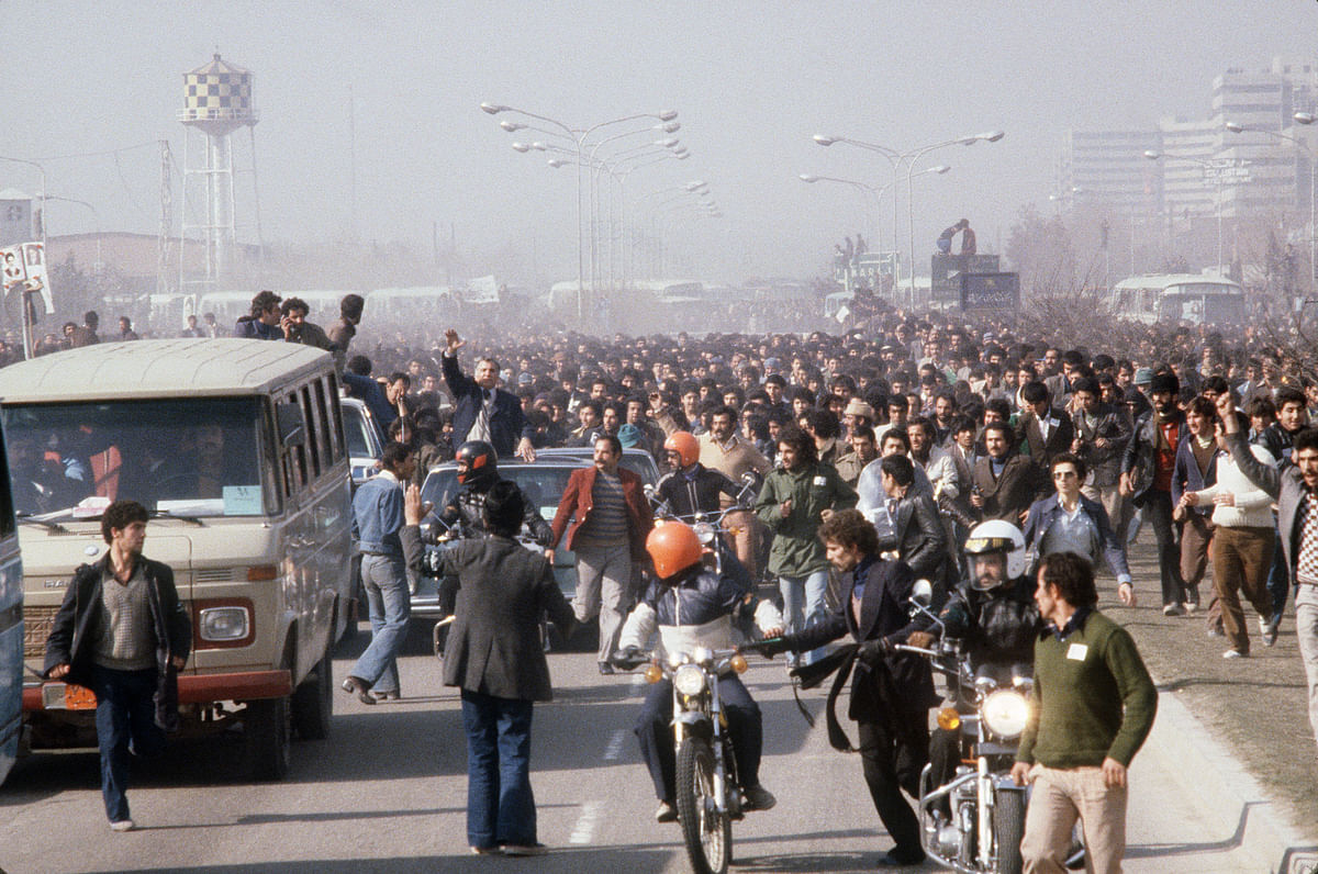 In this file photo taken on 01 February 1979 shows a crowd of Ayatollah Ruhollah Khomeini`s supporters in the airport area to welcome him in Tehran, the day of his return from France after 15 years of exile, as the insurrection against the Shah`s regime spreads all over the country. Photo: AFP