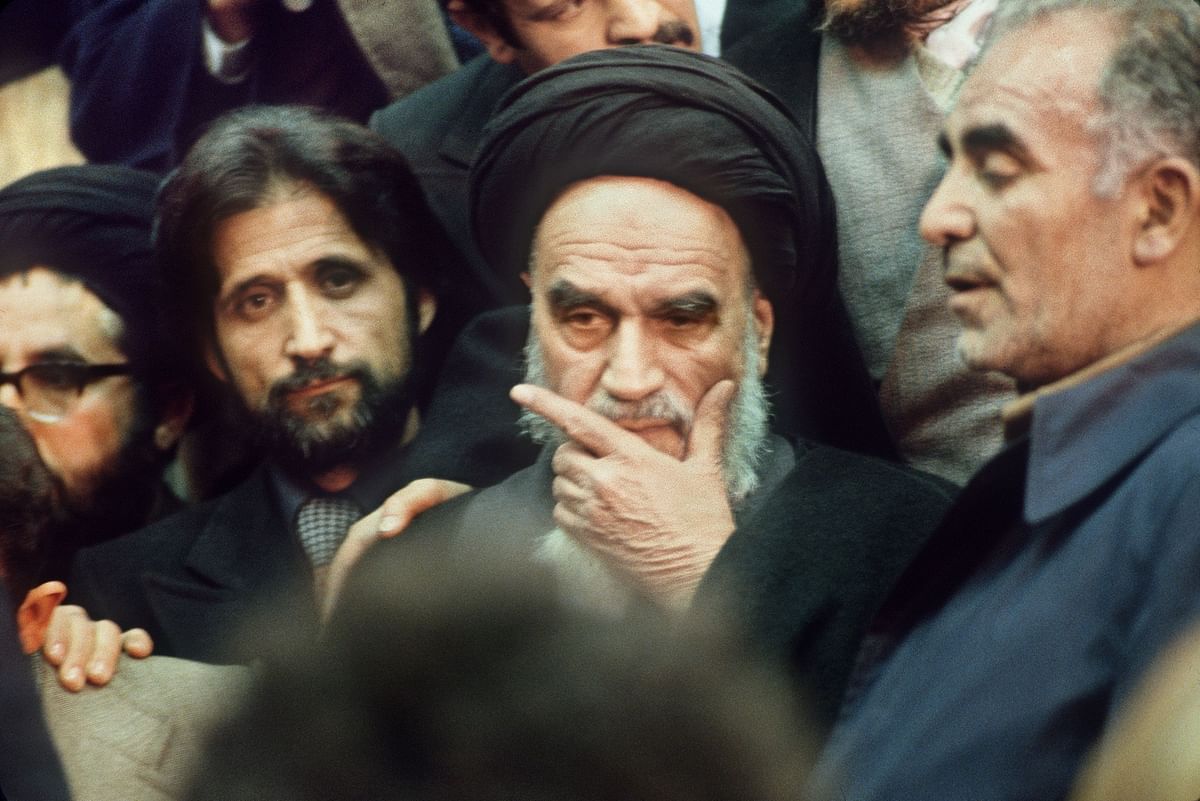 In this file photo taken on 01 February 1979 shows Ayatollah Ruhollah Khomeini surrounded by his supporters in Tehran, the day of his return from France after 15 years of exile, as the insurrection against the Shah`s regime spreads all over the country. Photo: AFP
