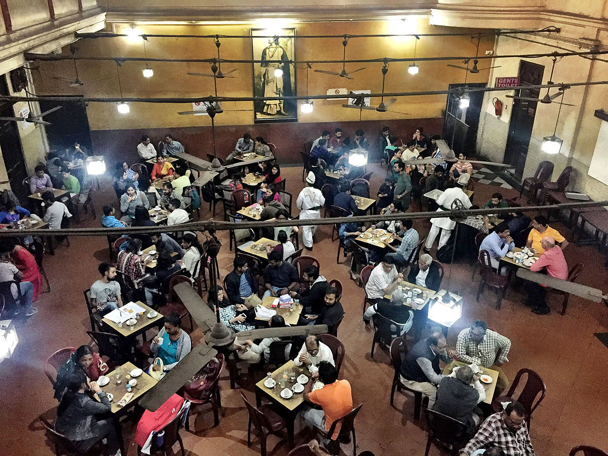 This recent photo shows people enjoying adda with their friends and families at the Indian Coffee House. Photo: Farjana Liakat