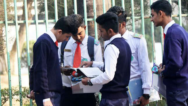 SSC examinees take last-minute preparations before their 2 February exam in Bogura city. Photo: Soel Rana
