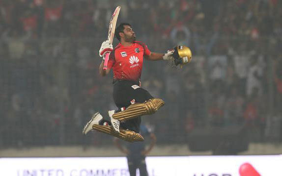 Tamim Iqbal celebrates his maiden BPL century at Sher-e Bangla National Stadium on Friday.  Photo: Prothom Alo