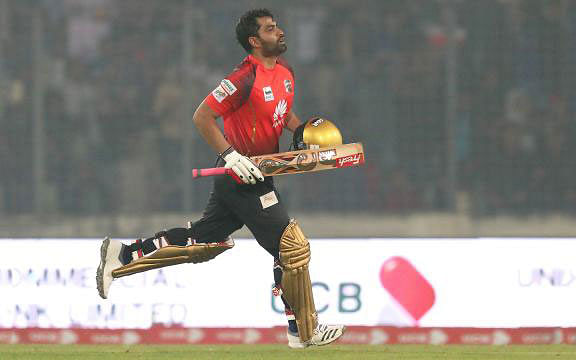 Tamim Iqbal celebrates his maiden BPL century against Dhaka Dynamites in the final match of BPL in Dhaka on Friday. Photo: Shamsul Haque